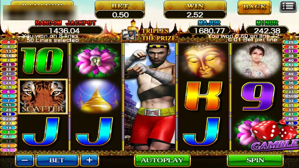 Amazing Thailand with the fighter on the middle reel and a banner reading Triples the prize, with a Gamble button bottom right