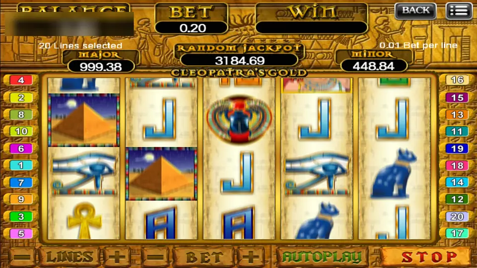 Cleopatra's Gold mid-spin with pyramids, Eye of Horus symbols and blue cats on the reels and a Stop button