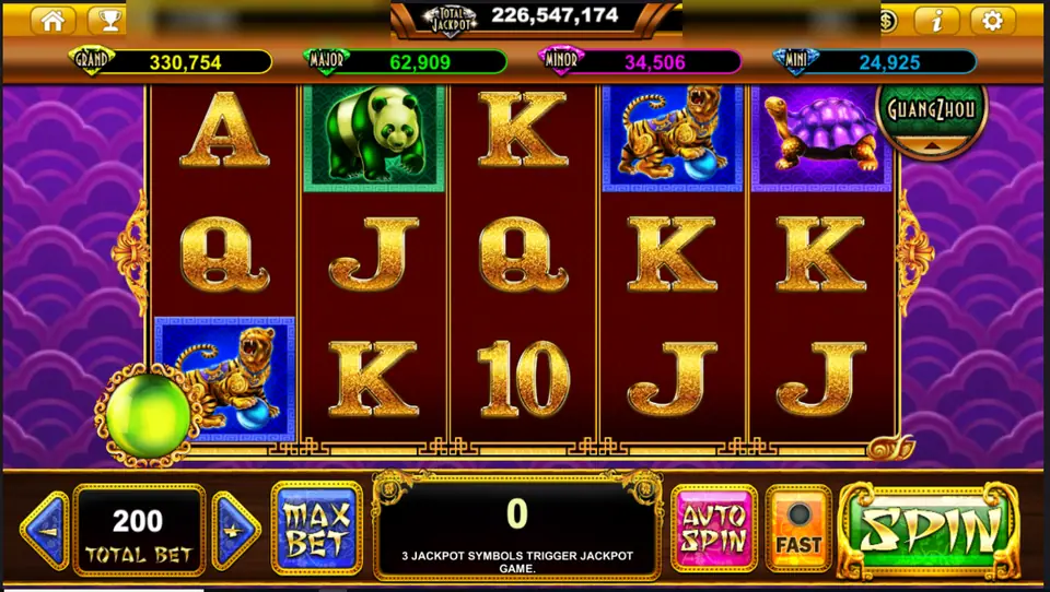 Age Of Golden Ape reels with a jade panda, golden tigers and a purple turtle on dark red, a green orb in the corner