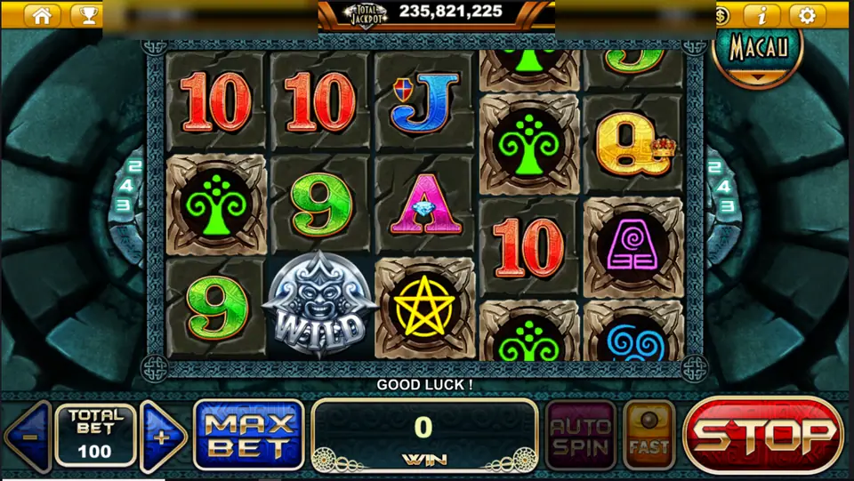 Mayan Element Of Life spinning, with a silver WILD mask and a yellow star on the reels