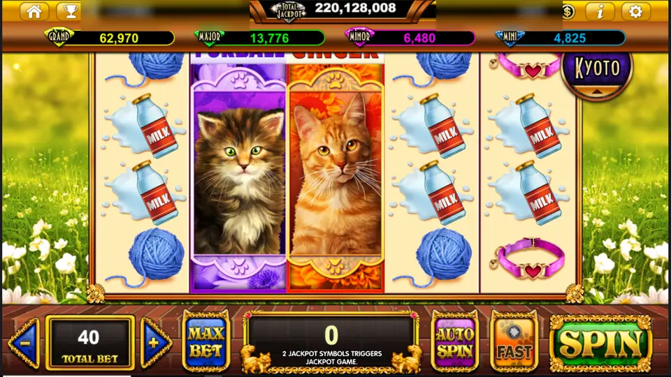 Pop Kittens reels with two full-reel kitten symbols, milk bottles and balls of blue yarn in a flower meadow